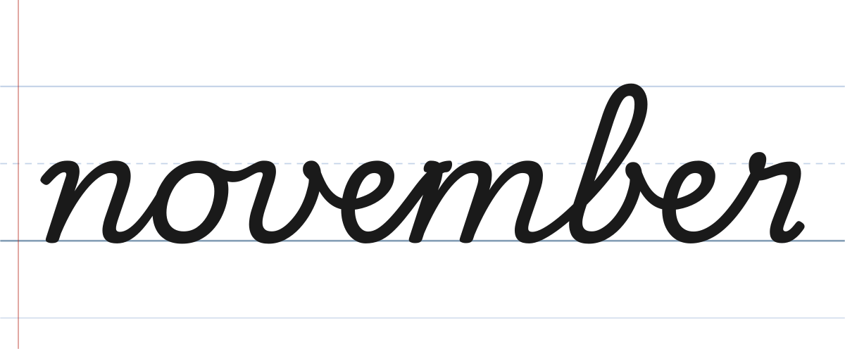 november in cursive with a lowercase n, written in traditional school cursive on ruled paper